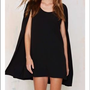 Black cape dress.