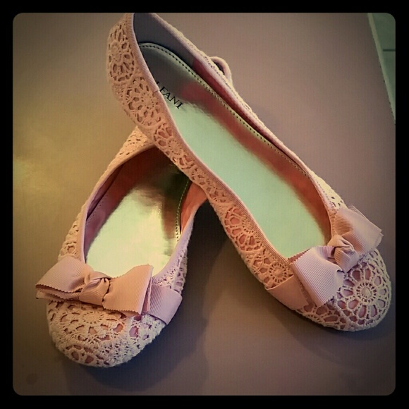 Pink eyelet flats