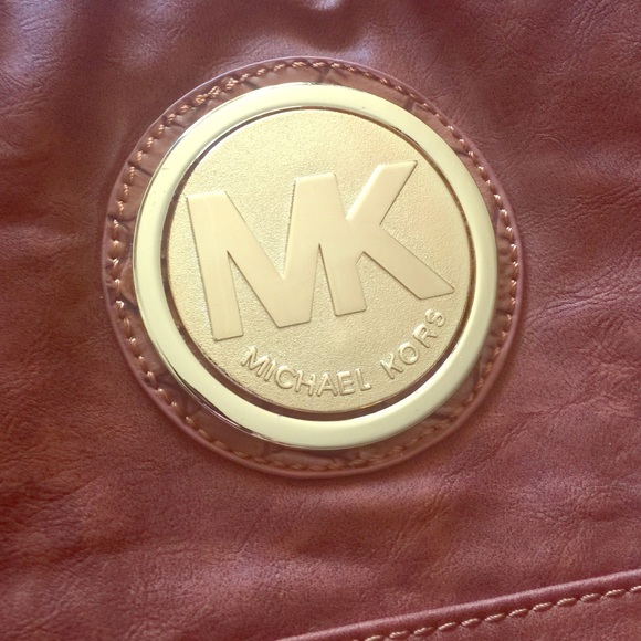 MK tan crossbody bag