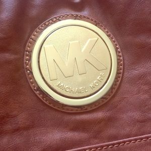 MK tan crossbody bag