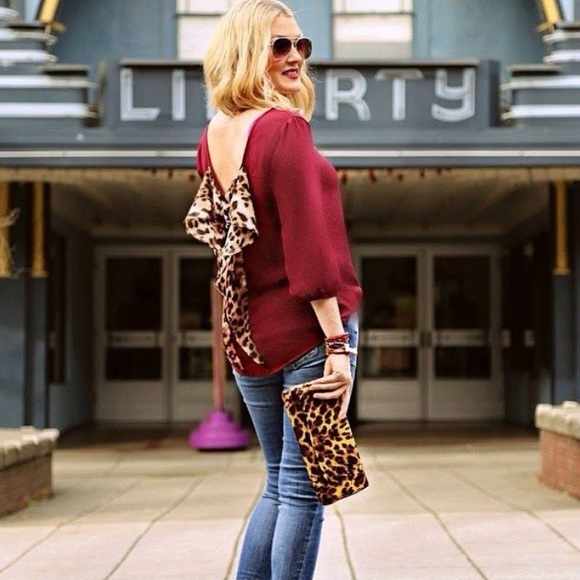 Charming Charlie Blouse w/ leopard bow detail.