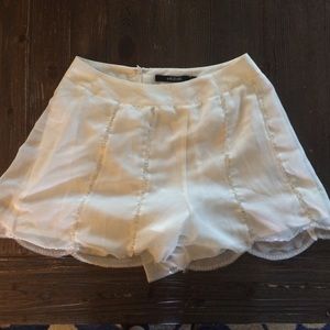 White scalloped shorts