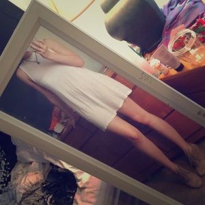 Slightly sheer mock neck tunic