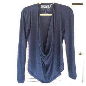 Top with exaggerated cowl neck/swoop.