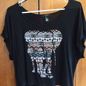 Black tea with Aztec  print elephant on it