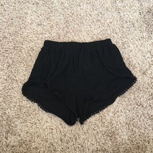 black pom pom tulip shorts