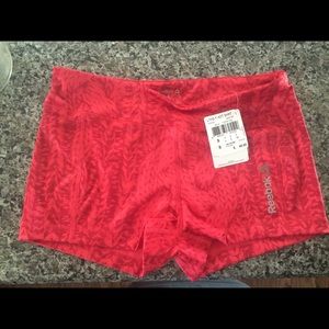 Red reebok workout shorts