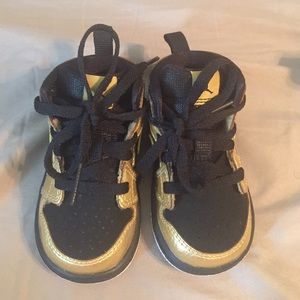 Black and Gold Air Jordan 1s