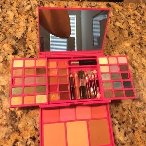 Makeup kit, bag and lipstick