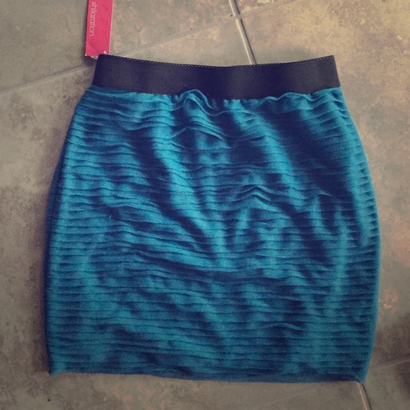 Brand new Teal mini skirt
