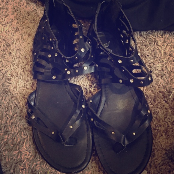 Black jewel studded sandals.