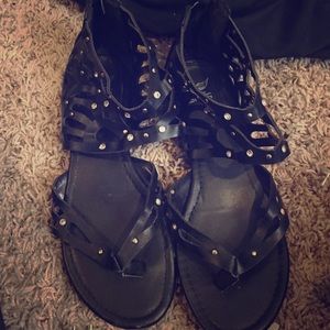 Black jewel studded sandals.