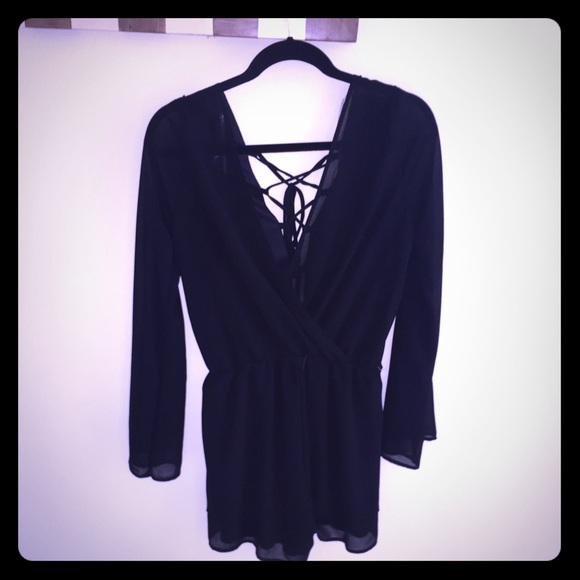 Stella Laguna beach long sleeve lace up romper