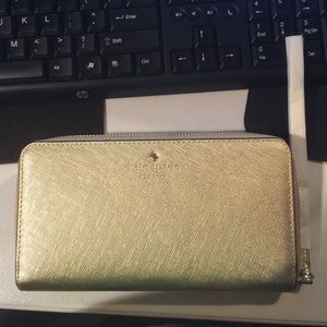 Kate Spade gold wristlet 💛💘