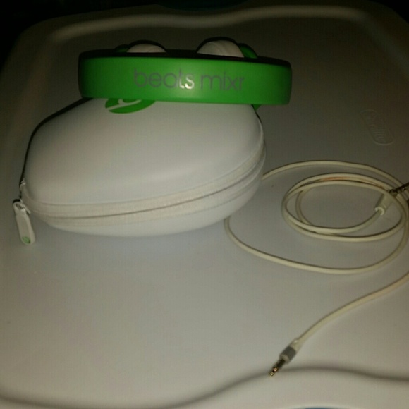 Limited Edition Lime Green Beats headphones on ear