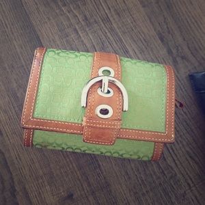 Authentic coach green and cognac leather wallet.