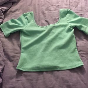 teal short sleeve crop top. Hardly worn.