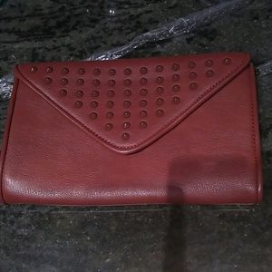Maroon studded clutch