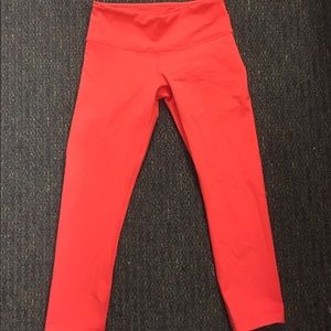 Lululemon wunder under crop in bright blood orange