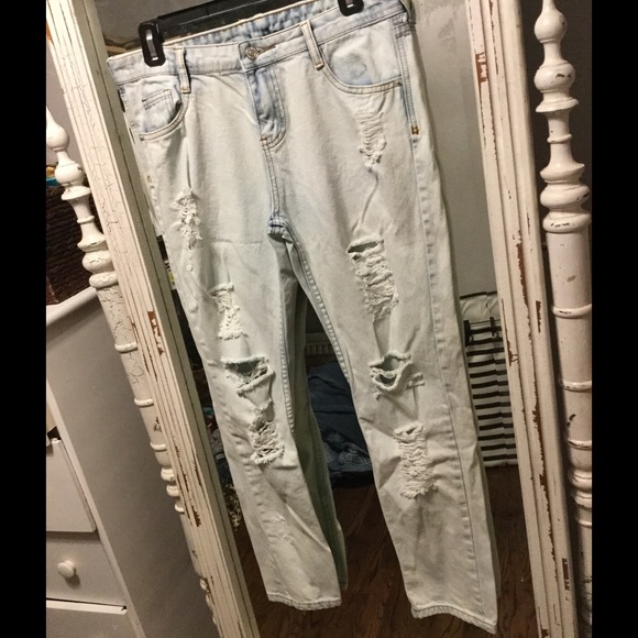 Destroyed vintage white wash jeans. Signature 8.