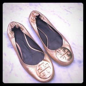 Tory Burch Reva flats in gold.