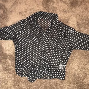Polka dot shirt.