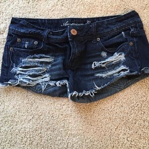 Distressed denim shorts