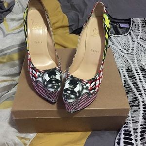 Louboutin print  red bottoms authentic
