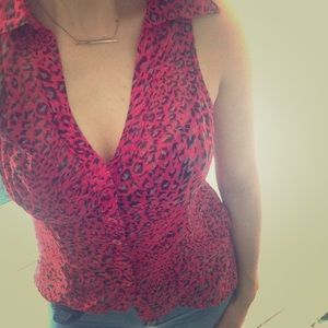 Sleeveless, button down, cheetah print blouse