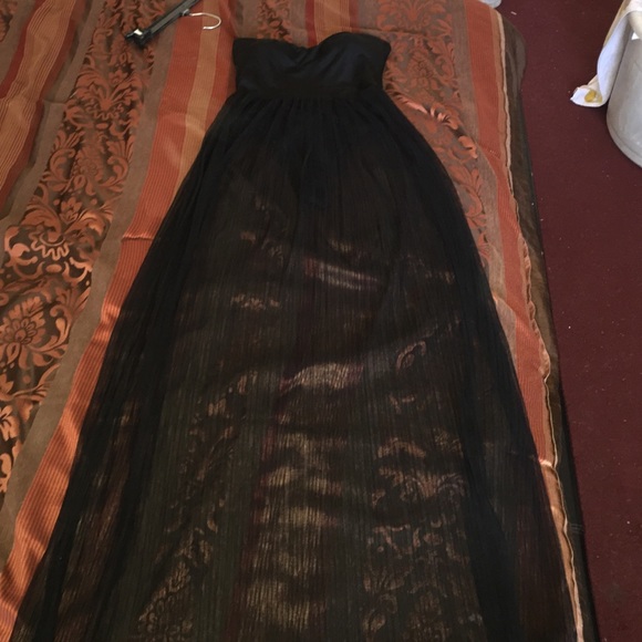 Long, see thru flowy dress.