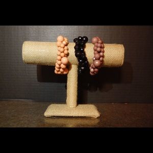 Set of three bubble elastic bracelets