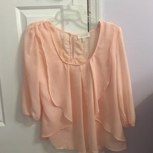 Peach blouse with cream lace