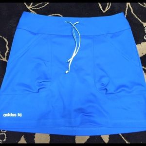 ADIDAS WOMENS MEDIUM GOLF SKORT BLUE/YELLOW