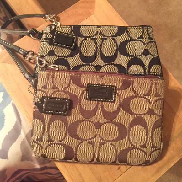 2 for 1 Coach wristlets.