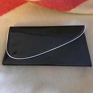 Cute vintage black clutch with white piping