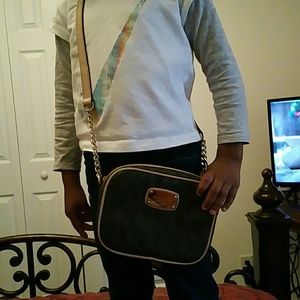 Michael kors Authentic leather cross body bag.