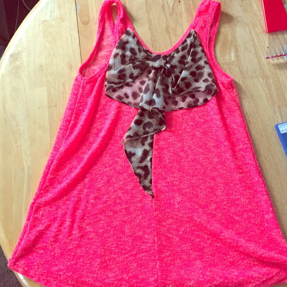 Neon pink tank top with cheetah print bow on back