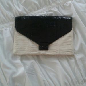 Black and ivory snakeskin clutch
