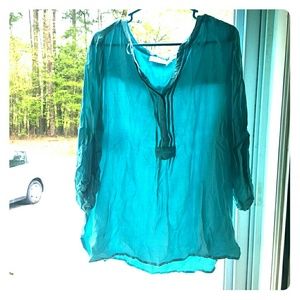 Silky turquoise shirt with buttons at top