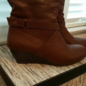 Brown, heeled boots. NEVER WORN!
