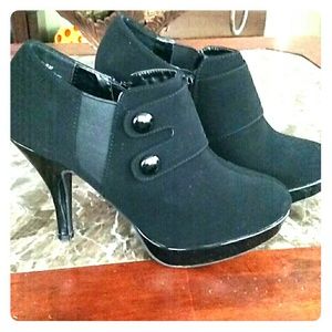 Black closed toe bootie heels