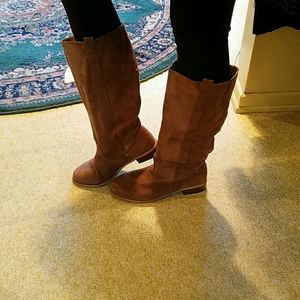 Under the knee suade boots.