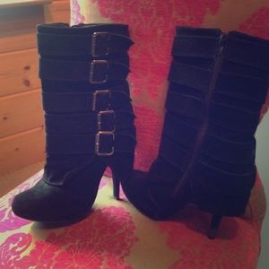 Black, heeled boots with straps