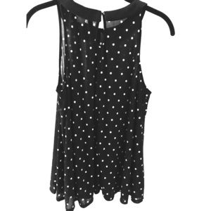 Black polka dot sleeveless blouse