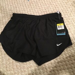 Black Nike running shorts