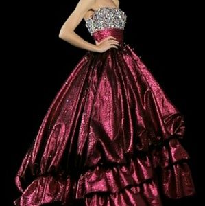 Beautiful ballgown dress with matching sash.