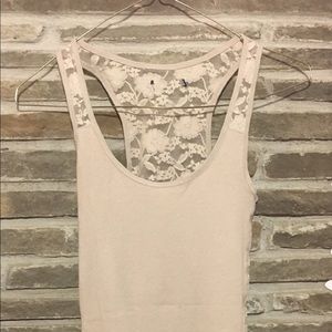 Taupe tank top with lace back.