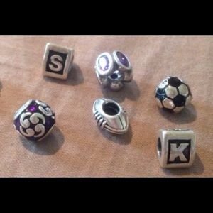 Football, soccer ball, and zen charms