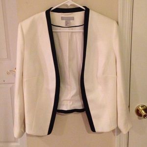White blazer with black trim