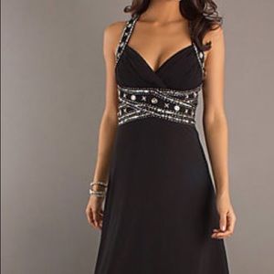 Black floor length dress with open back
